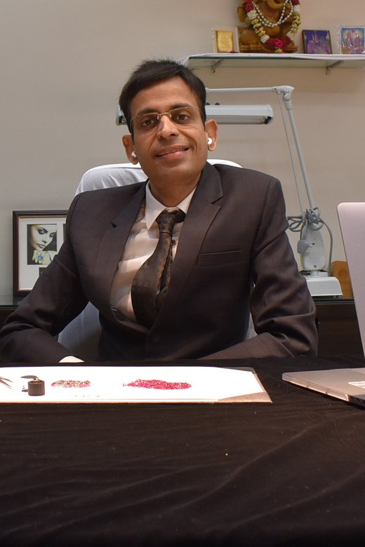 Mr. Rajnesh Kant Singhania, Chairman and Director of Shree Omkar Jewellers